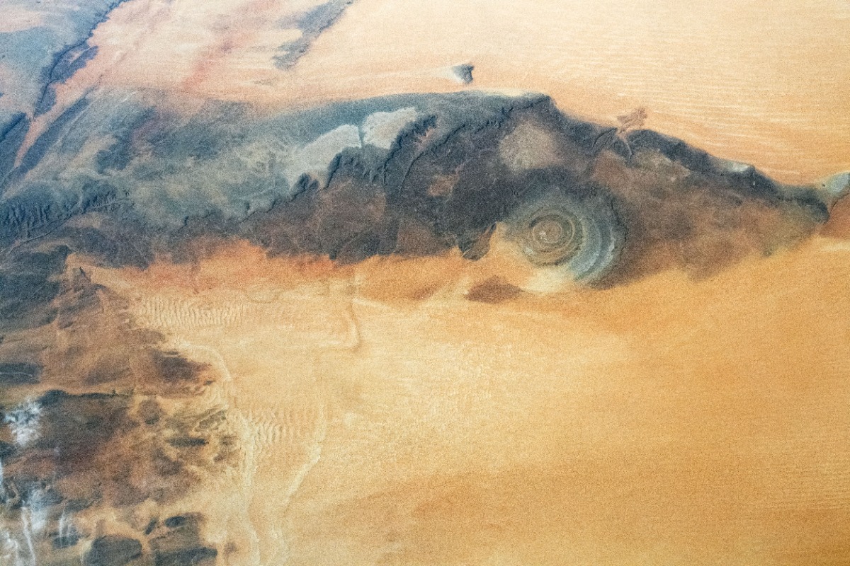Full NASA photograph of the Richat Structure surrounded by Sahara dunes